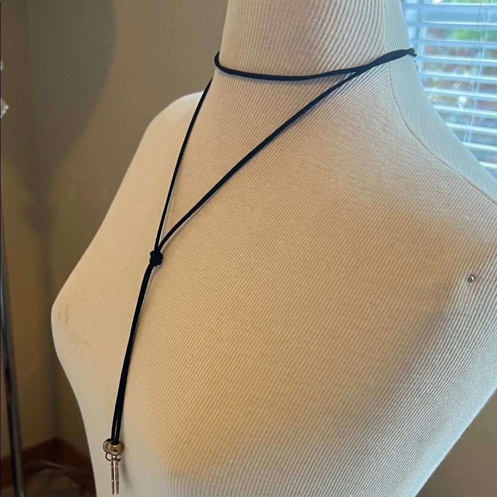 Elegant Black and Gold Feather Pendant Necklace